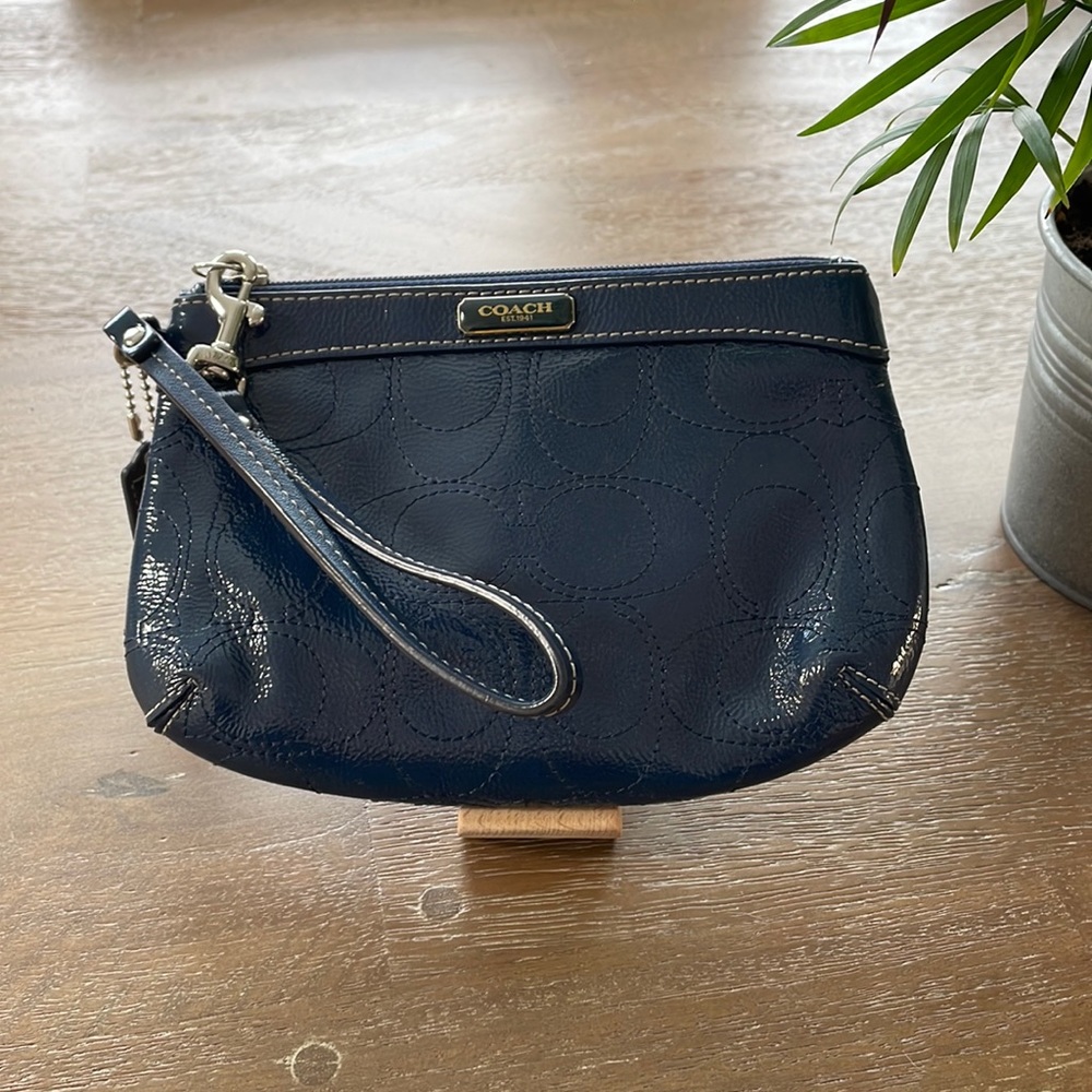 Navy blue patent leather coach clutch wristlet